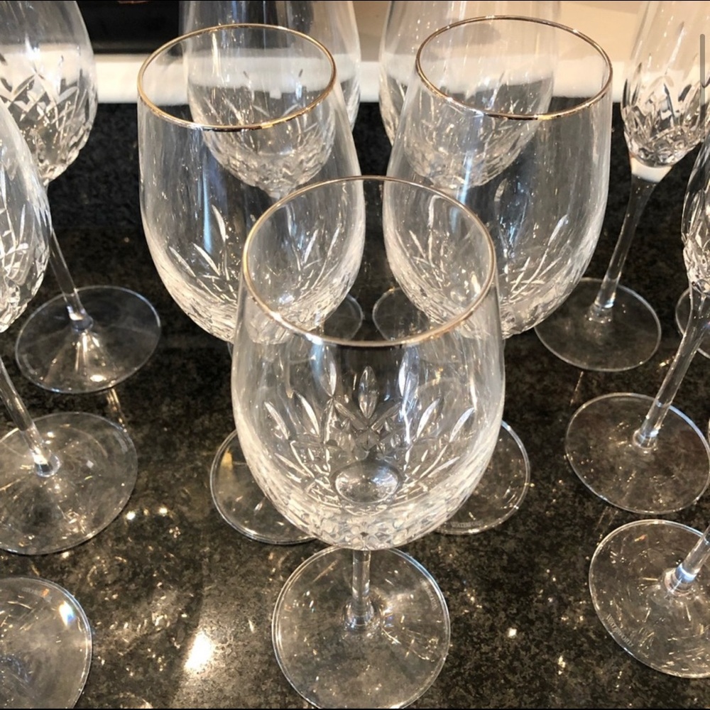 5 Waterford white glasses